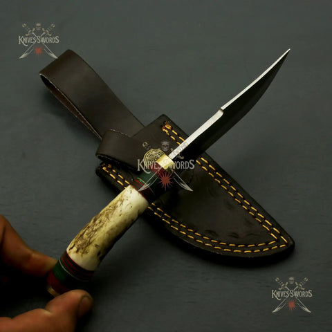 Beefy Stainless Steel Fixed Blade Knife With Wood Bolster Handle And Leather Sheath 8 Inch Overall resting on black surface.
