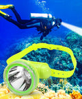 Underwater Dive Headlamp With IPX8 Waterproof, Rechargeable Scuba Light, 3 Modes, shown underwater with a scuba diver