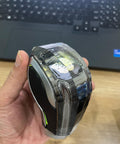 Hand holding Dope Touch Activated LED Crystal Color Changing Automatic Gear Shift Knob With Lock Button on wooden table.