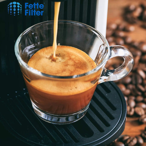 Brewed coffee pouring into clear cup using Water Filter Cartridge Replacement For Select Coffee Makers XP5220 XP5240 XP5280 EA82 EA9000