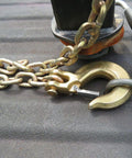 Close-up of 4 Pack 5/16 Inch Grade 70 Clevis Slip Hooks with Safety Latches and chain for towing tasks.