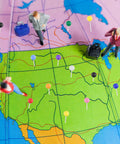 Total Game Changer 1000 Piece Assorted Color Map Push Pins For Travel World Map Markers And Wall Decoration Compact Size Thumbtacks With Slick Storage Box on colorful map with figures.
