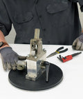 Heavy Duty Manual Turntable Platform Built Tough With 500 Lb Capacity And Rubber Top for extra grip in use by technician
