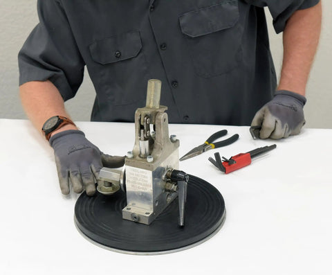 Heavy Duty Manual Turntable Platform Built Tough With 500 Lb Capacity And Rubber Top for extra grip in use by technician