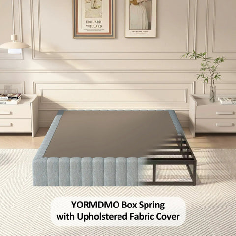 Queen Box Spring With Upholstered Fabric Cover High Profile Heavy Duty Metal Frame Foam Padded Edges Quick Setup in a stylish bedroom.