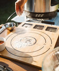 Large Bamboo Cutting Board With 3 Shatter Resistant Containers And Lids For Kitchen Prep in use during outdoor cooking