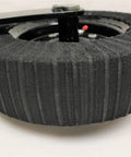 Close-up view of Heavy Duty 15 Inch Laminated Tire Idler Roller Axle with textured black rubber surface and metal yoke shaft.