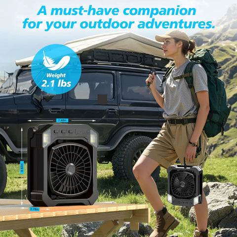 Solar Powered Camping Fan With 10000mAh Battery USB Rechargeable in outdoor setting with weight displayed, woman holding fan