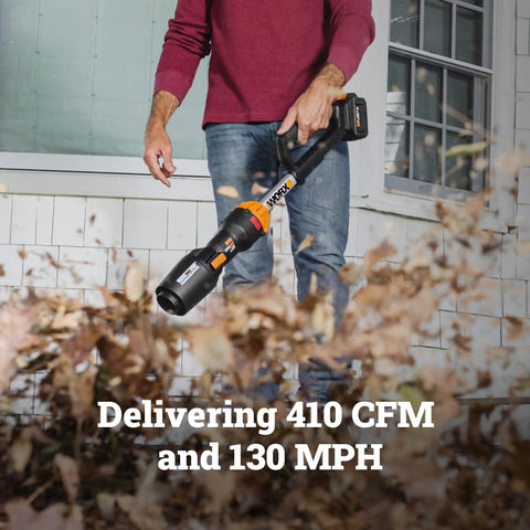 Person using Nitro Cordless Leaf Blower With 410 CFM Airflow And 130 MPH Turbo Power, Ultra Lightweight At 3.8 Lbs, WG543