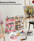 Beige 3 Tier Rolling Cart With Metal On Wheels in art studio, holding paints and supplies, alongside a pink version loaded with brushes.