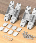 Hidden Door Hinges 5.5 Inch Open 180 Degrees, 3 Way Adjustable Invisible Butt Hinge for Secret Doors and Bookshelf Doors, Silent Smooth Operation, Universal Left Right Fit, 2 Pack, Silver, laid out on a wooden surface with screws and tools.