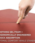 Close-up of Anti Fatigue Standing Desk Floor Mat For Home Office Kitchen Garage Red 18x22 Inch showing soft gel foam surface.