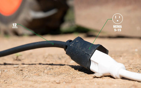 Heavy Duty 12/3 25 Foot Extension Cord For Farm And Shop Use All Copper Wire SJTOW on dirt next to tractor tire