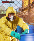 Person wearing yellow protective suit and Badass 15 Mil Nitrile Chemical Resistant Gloves With Rock Solid Acid Alkali Solvent Shield.
