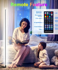 Corner Floor Lamp RGB Mood Light With 16 Million Colors And 210 Dynamic Modes, 56.7 Inches Tall, in a cozy bedroom scene with remote feature.