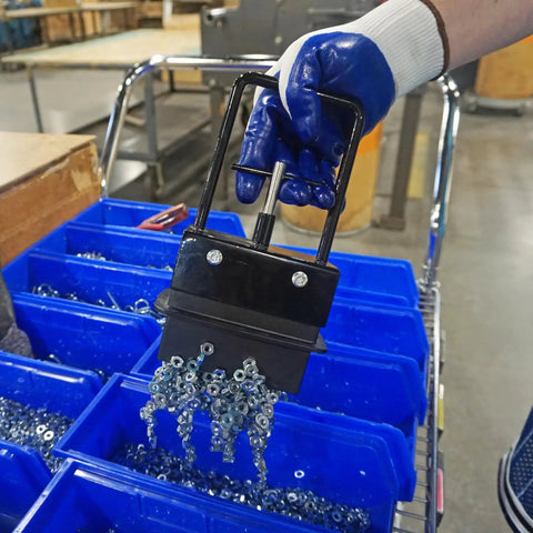Heavy Duty Magnetic Bulk Parts Lifter With Release And Handle For Nails And Metal Up To Five Pounds Perfect For The Jobsite Garage Or Workshop Cleanup With Smooth Release Lever For Easy One Hand Operation lifting metal nuts.