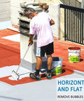 Person using heavy duty spike roller kit for self leveling concrete and epoxy floors with pro grade 9 inch screed roller and pole.