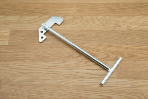 Universal Garbage Disposal Unjamming Wrench For Quick Jam Release Fits Waste King And Moen Disposals on wooden surface