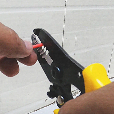 Heavy Duty Wire Stripper And Cutter Tool For 20-30 AWG Solid And Stranded Wires, Spring Loaded For Quick Snips in use