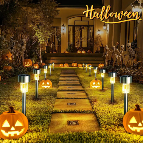 Sun Powered Solar Pathway Lights Outdoor Waterproof Stainless Steel LED Garden Lights lining a Halloween-themed path