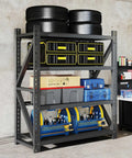 Rock Solid 69 Inch Black Metal Shelving Unit Heavy Duty Steel Rack With Tool Free Setup For Garage Warehouse Mega Storage, loaded with tools and tires.