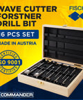 Badass 16 Piece Wave Cutter Forstner Bit Set With Slick Patented Geometry For Dead On Accuracy And Splinter Proof Woodworking Holes In Rugged Custom Wooden Storage Box, displayed in wooden box.