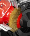 Close-up of Workhorse 150Mm Bench Grinder Equipped With A Beefy 450W Induction Motor showing heavy steel wire brush for cleaning.