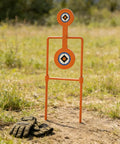 Double Spinner Auto Reset Steel Target For Handguns Up To.44 Magnum With 3.5 Inch And 4.5 Inch Targets For Centerfire Practice At 30 Yards Built Tough For Quick Repeats And Realistic Range Training on grassy field