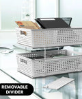 Total Game Changer Slick Sliding Under Sink Organizer With Adjustable Divider And Portable White Baskets For Kitchen Cabinets And Bathroom Vanity No Sweat Storage, stacked baskets on a clear desk.