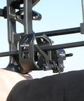Close-up of Drop Away Arrow Rest For Right Hand Compound Bow With Cable Activated Full Containment showing adjustment knob.