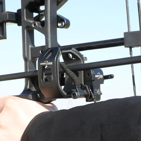 Close-up of Drop Away Arrow Rest For Right Hand Compound Bow With Cable Activated Full Containment showing adjustment knob.