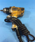 Heavy Duty Air Impact Wrench With 14 Pin Anvil Socket And Massive Torque Rating Built For Real Mechanics Who Need A Tough As Nails Tool To Rip Loose Stuck Fasteners Without Breaking A Sweat Daily, showing worn yellow exterior and coiled hose.