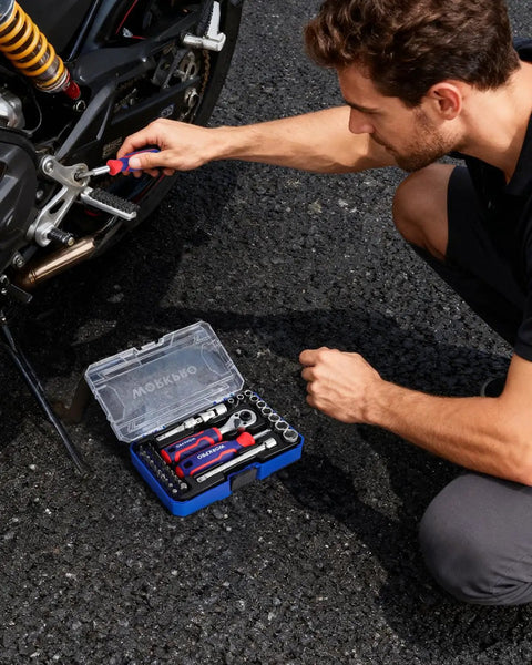 Man using 34 Piece One Fourth Inch Drive Mini Socket Ratchet Set With Bits Magnetic Driver Dual Socket And Bit Head Ratchet