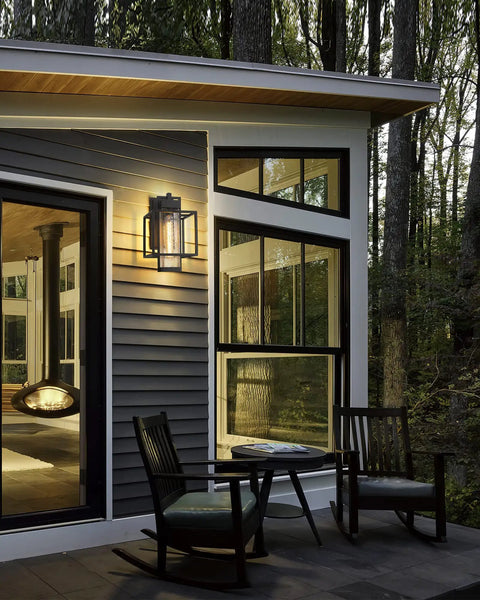 Outdoor Wall Sconce 2-Pack Farmhouse Exterior Lanterns in Black Finish With Bubble Glass Shades mounted on modern patio wall
