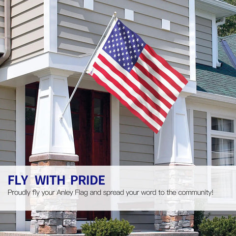 Fly Breeze 3x5 Foot American National Flag With Fade Proof Colors, Canvas Header And Double Stitched Edges displayed outside a house.