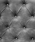 Kick Up Your DIY Game With Sleek Stainless Steel Upholstery Tacks Delivered Straight To Your Door With Top Shelf Decorative Furniture Nails Designed For Easy Sofa And Headboard Projects on a gray tufted fabric headboard.