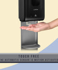 Solid Touchless Hand Sanitizer Dispenser On Heavy Duty Steel Floor Stand With Catch Tray And Refillable Bottle For No Sweat Hygiene Setup At Your Office Or Store showing motion-activated dispensing.