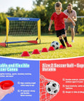 Child playing with Backyard Kid Friendly Soccer Goal Set Pack Of Two Portable Pop Up Nets With Ball And Cones Complete Training Gear For Ages 3 To 8 Easy Fold Pop Up Design For Quick Setup And Hours Of Outdoor Fun on grass field.