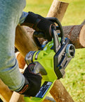 Hella Smooth 18V Brushless Battery Chainsaw With 30Cm Oregon Bar in use, cutting through logs with ergonomic grip and safety features.