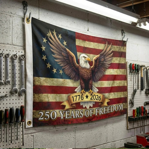 250th Anniversary American Flag 3x5 Feet Outdoor Indoor Totally Patriotic Flag Made From 100 Percent Polyester With Brass Grommets Fade Resistant Eagle Theme Flag For Home Party Porch Or Gift displayed in a workshop.