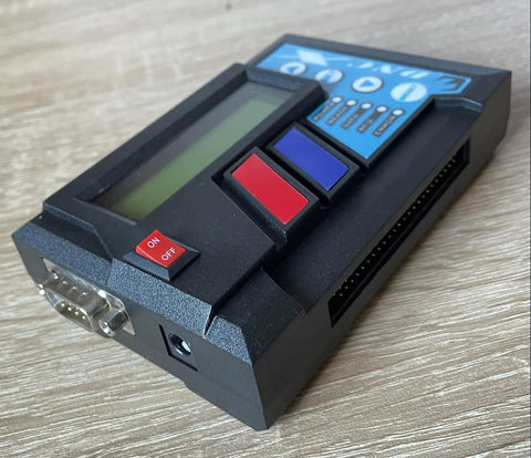 Drip Feed CNC Interface for Legacy CNC Machines showing RS232 port and control buttons, designed for seamless CNC communications.