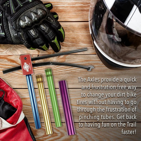 No Pinch Tire Changing Kit For Dirt Bikes And Motocross Axles 15mm Fitment tools on wooden surface with helmet and gloves