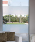 Static Cling Window Film No Adhesive Milky Tint 90cm By 150cm installed on glass door, providing privacy and reducing glare.
