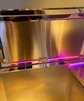Interior view of a shiny stainless steel door in a turnkey electric mobile food truck trailer for sale featuring customizable layout and zero hassle setup.