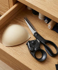 Infrared Laser Guided Scissors For Fabric And Paper Cutting With Dope Precision Laser Line in wooden drawer with sewing items