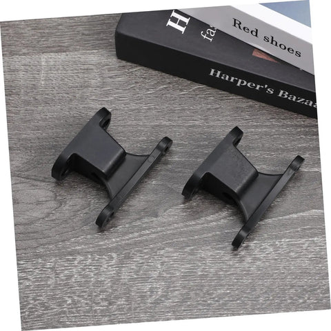 Two Pack RV Door Holder Black T Shaped Nylon Retainer Kit For Camper Motorhome And Travel Trailer Door Latch Stop Catch Easy Install Accessory No Fuss shown on wooden surface