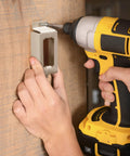 Installing Walk-Through Top Of Stairs Baby Gate In Natural Wood With Four Point Mount, easy setup for busy homes