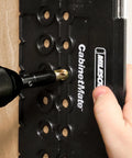Milescraft 2312 5mm ShelfPinBit for drilling shelf pin holes on black CabinetMate jig (front view)