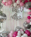 Showstopping 22 Inch Silver Disco Balloons Pack of 6 4D Sphere Balloons for Disco Party Decorations Retro 70s Theme Birthday Anniversary Decor and Photo Backdrops for Lit Party Vibes amid colorful setup