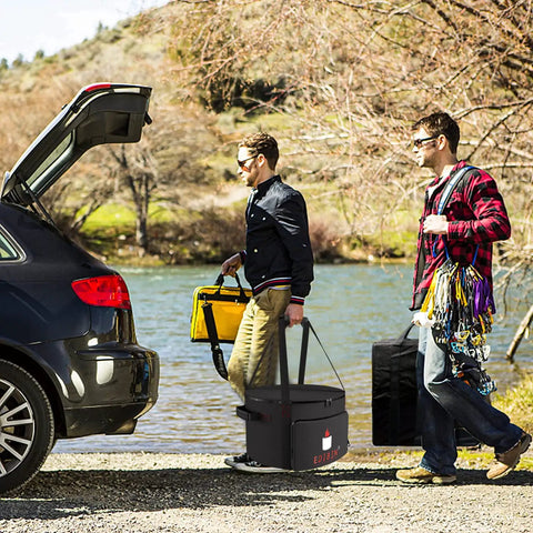 Two men loading a car with Rugged Outdoor Smokeless Fire Pit Bag For Bonfire Style Pits 19.5 Inch Diameter And 14 Inch High Campfire Ready Carry Bag